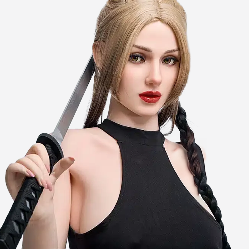 Realistic love doll with long pink hair and lingerie posed on a lace-covered bed in bedroom setting