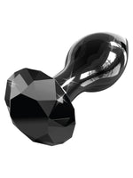 Pipedream Icicles No 78 Buttplug Svart – pluggen liggende horisontalt, viser den fasetterte basen og glatte glasskroppen mot hvit bakgrunn