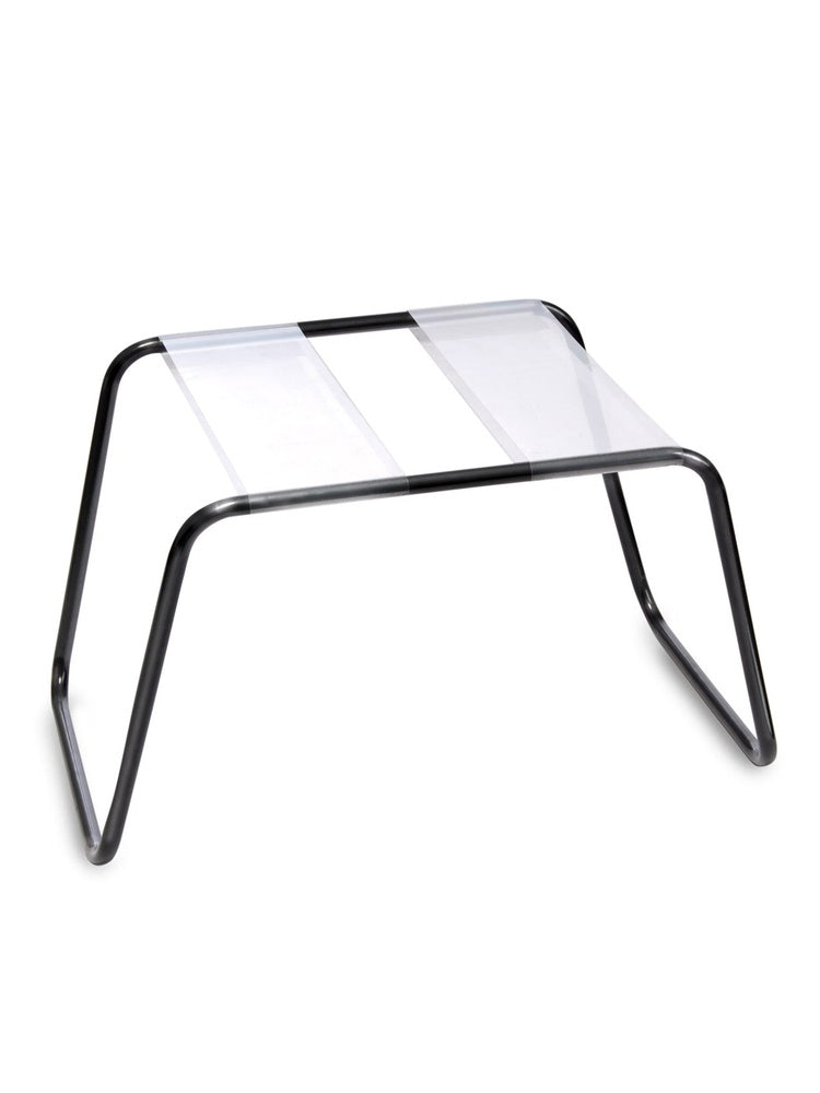 Fetish Fantasy Series The Incredible Sex Stool sett skrått ovenfra. Svart buet metallram med transparent sete i nylon, hvit bakgrunn.
