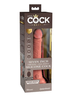 King Cock Elite Seven Inch Vibrating + Dual Density Silicone Cock i originalemballasje – brun eske med transparent front, produktbilde og Pipedream-logo.