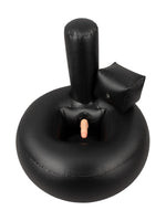 Oppblåsbar sexpute med realistisk vibrator, sett skrått ovenfra. Ekstra oppblåsbar hodestøtte synlig bak, svart materiale med vibrator i midten.