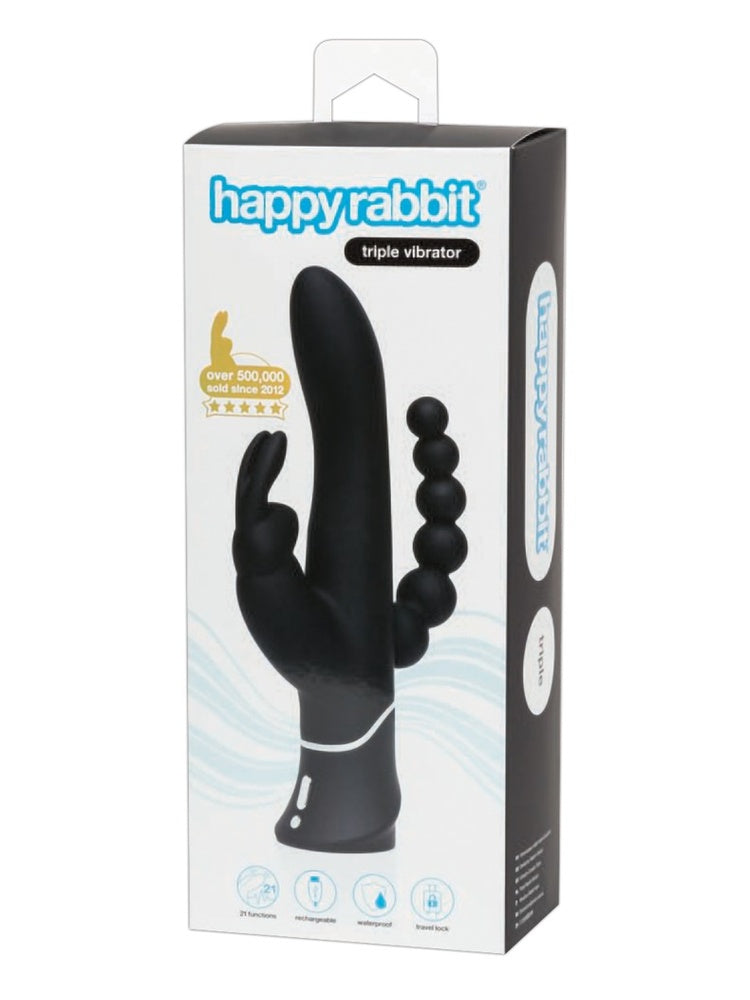 Produkteske for Happy Rabbit Triple – svart og hvit emballasje med produktbilde, merket «over 500 000 solgt siden 2012», samt ikoner for funksjoner som oppladbar, vanntett og reiselås.