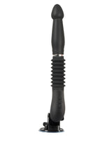 RC Fucking Machine stående på sugekoppstativ med rillet thrusting-mekanisme fullt synlig og knapper på håndtaket mot hvit bakgrunn.