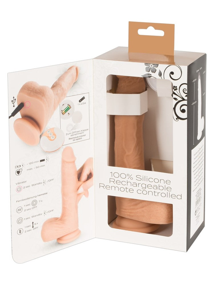 You2Toys Natural Thrusting Vibe – åpnet forpakning med oversikt over funksjoner og fjernkontroll