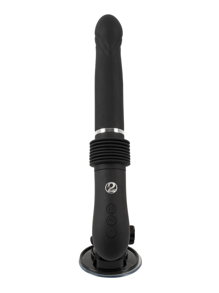 RC Fucking Machine 2.0 sett rett forfra i stående posisjon. Tydelig visning av sugekopp, styreenhet med You2Toys-logo, belg og realistisk tupp.