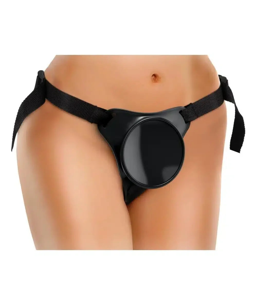 Adjustable black strap-on harness worn on hips, featuring a circular front panel.