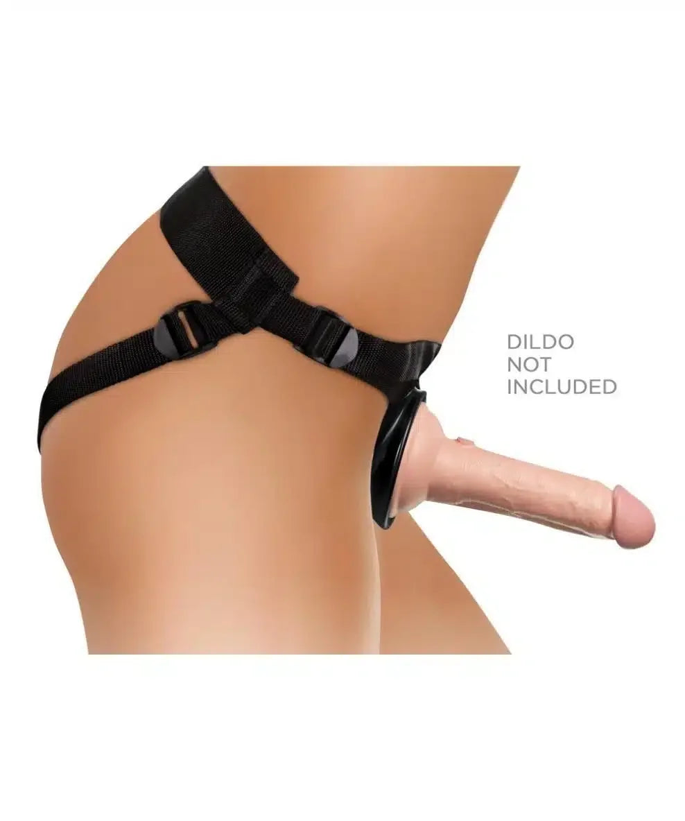 Adjustable strap-on harness worn on waist, with detachable dildo shown for demonstration