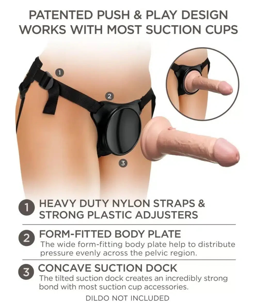 Adjustable strap-on harness with heavy-duty nylon straps, body plate, and suction dock for compatible attachments.