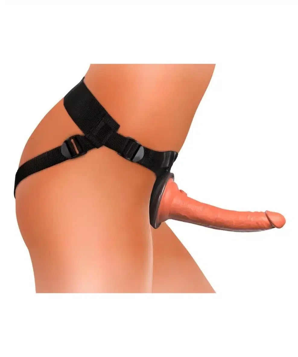 Adjustable black strap-on harness with realistic dildo on a model's waist