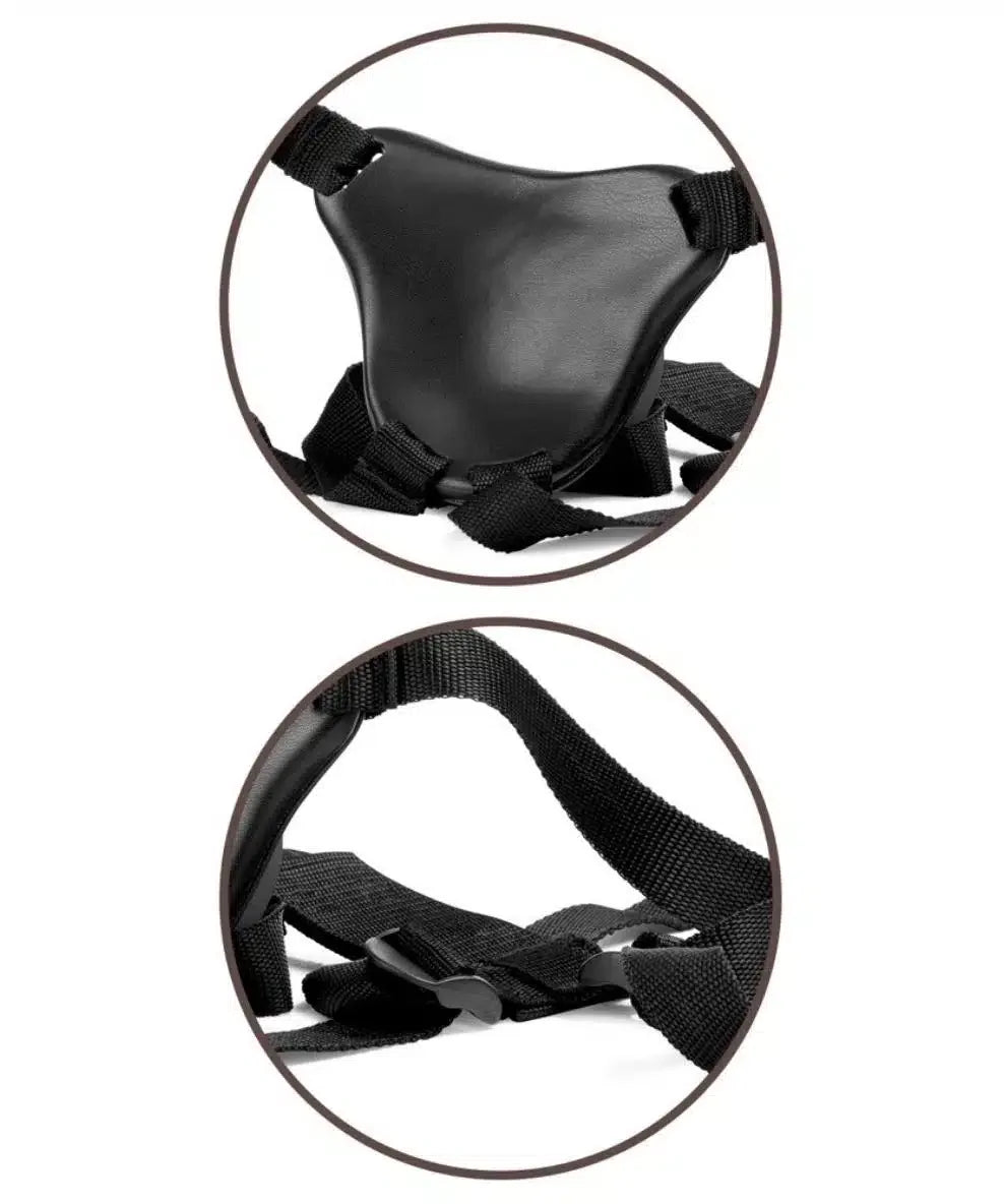 Adjustable black harness with straps and padded front piece, close-up product view