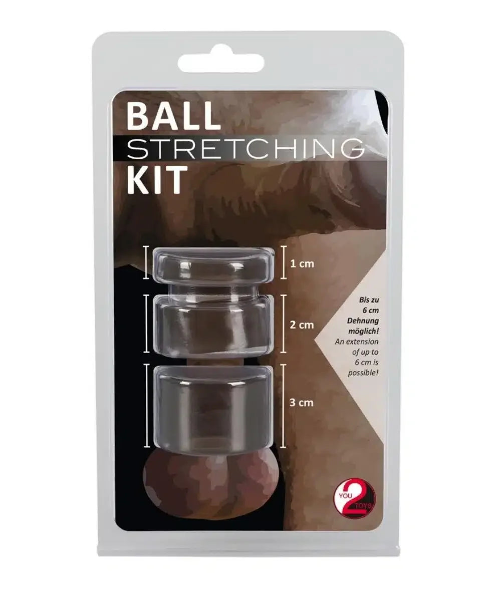 Clear silicone ball stretching kit in retail packaging with three sizes for adult use