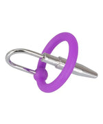Silver urethral plug with attached purple silicone ring on white background