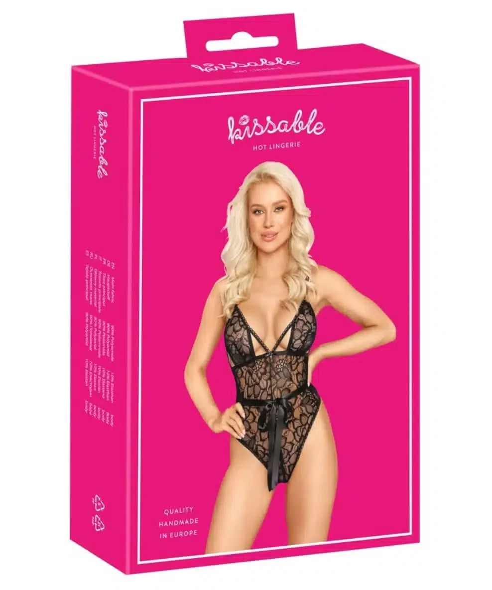 Kissable lingerie package featuring model in black lace bodysuit, pink box background