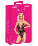 Kissable lingerie package featuring model in black lace bodysuit, pink box background