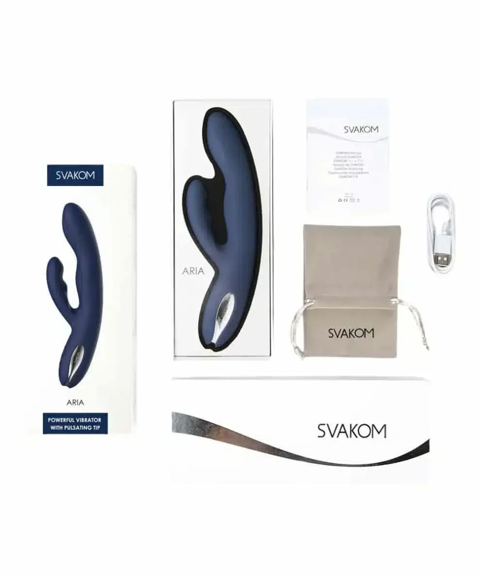 Svakom Aria rabbit vibrator set with packaging, charger, pouch, and instruction manual.