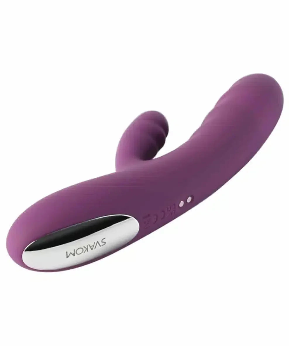 Purple silicone rabbit vibrator with curved design and metallic accent detail