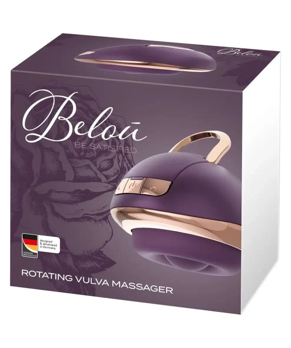 Purple and gold rotating vulva massager in packaging with rose illustration and logo.