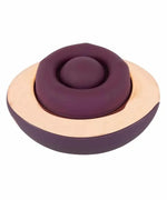 Purple and gold compact intimate massager with circular design on white background