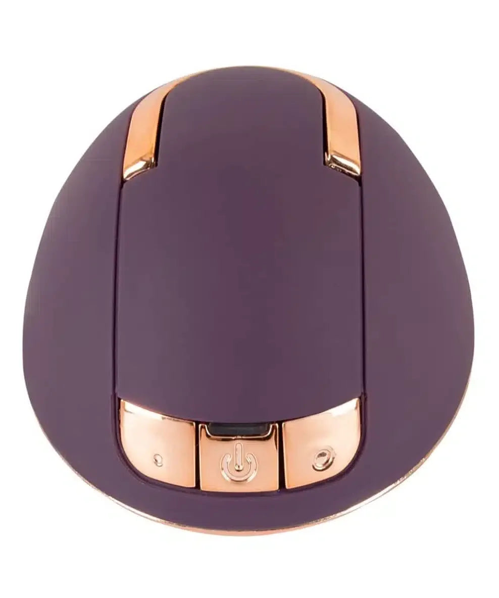 Purple and gold ergonomic personal massager with control buttons on a white background