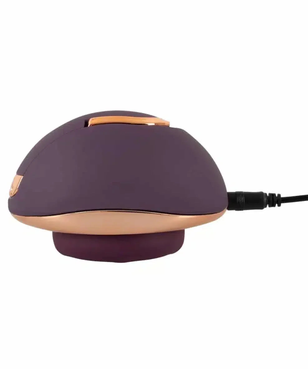 Purple and gold rechargeable intimate massager with USB cable attached
