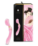 Pink curved intimate massager with textured design, beside elegant decorative box featuring an illustrated woman in traditional Japanese attire.