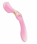 Pink silicone vibrator with ergonomic shape and textured handle on white background