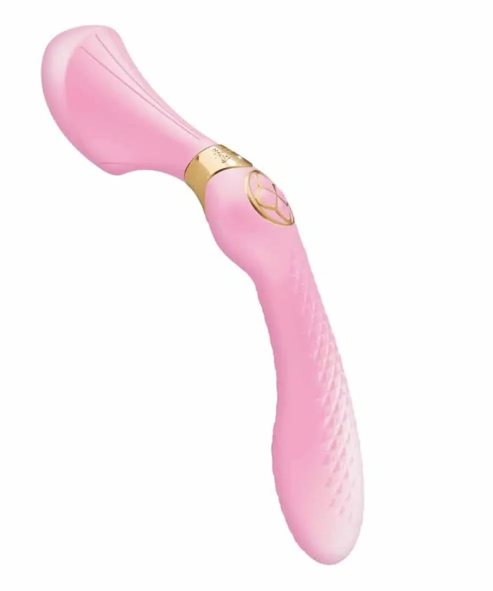 Pink silicone vibrator with ergonomic shape and textured handle on white background