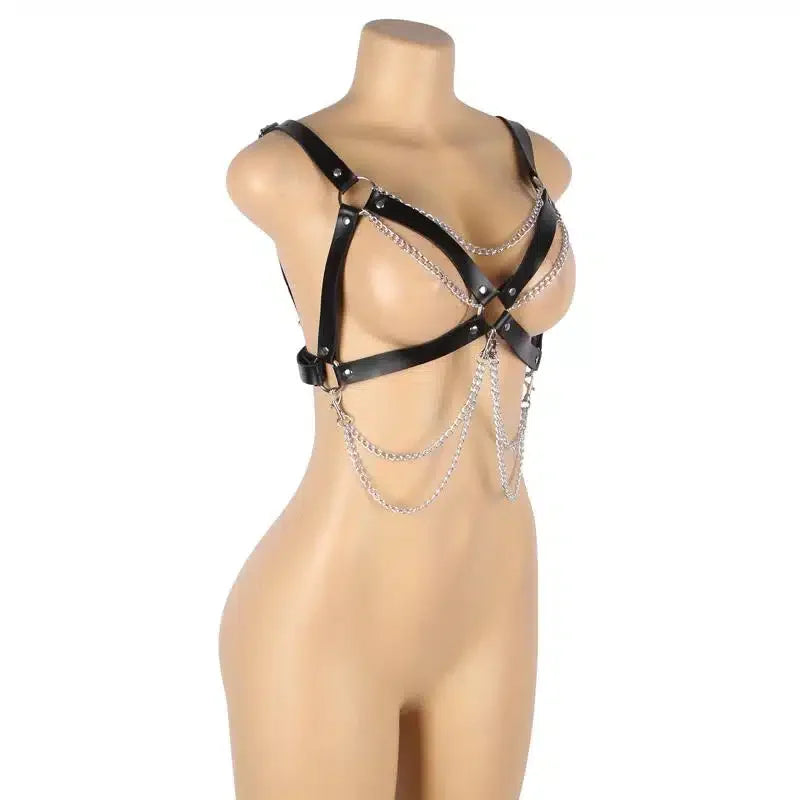 Black leather harness with silver chains on mannequin, body harness lingerie