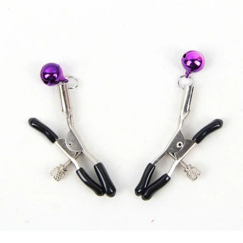 Silver nipple clamps with black silicone tips and purple bells on white background