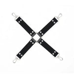 Black leather adjustable hogtie restraint with metal rivets and clips on white background