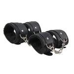 Set of black adjustable wrist and ankle cuffs with soft lining and metal chains