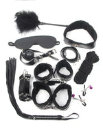 Black bondage kit with cuffs, blindfold, rope, collar, flogger, tickler and accessories