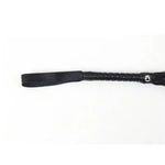 Black leather spanking crop with handle and wrist loop on white background