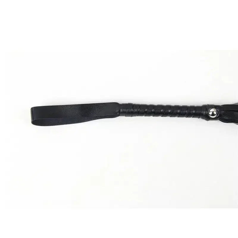 Black leather spanking crop with handle and wrist loop on white background