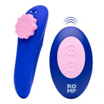 Blue and pink wireless remote control vibrator with textured surface and control buttons.