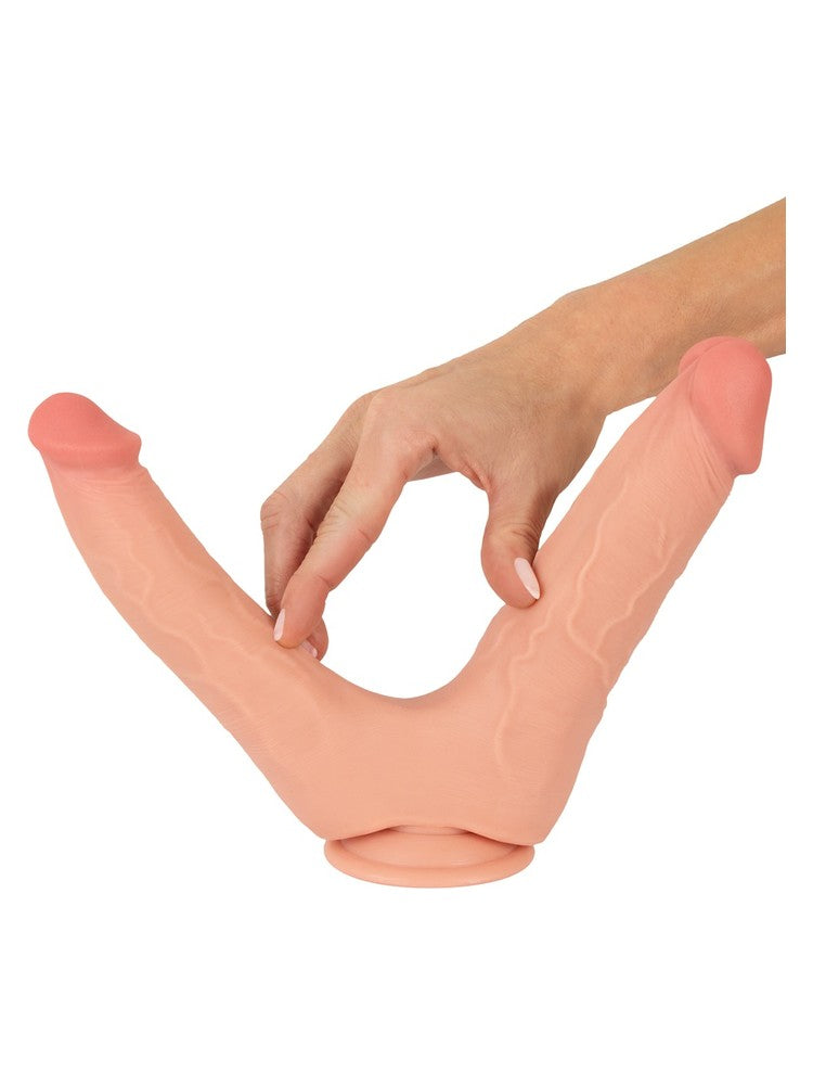 Nature Skin Bendable Double Penetrator – hånd bøyer dildoene fra hverandre