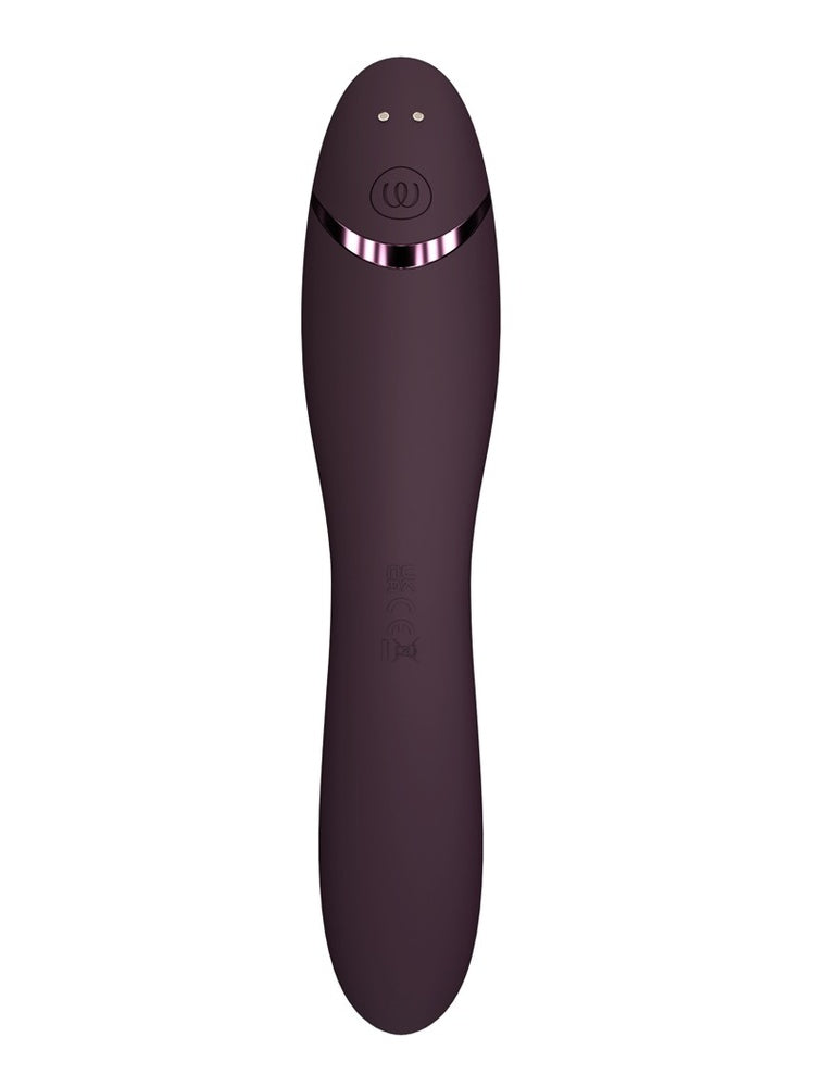 Womanizer OG i aubergine, sett bakfra med ladekontakter og logo.