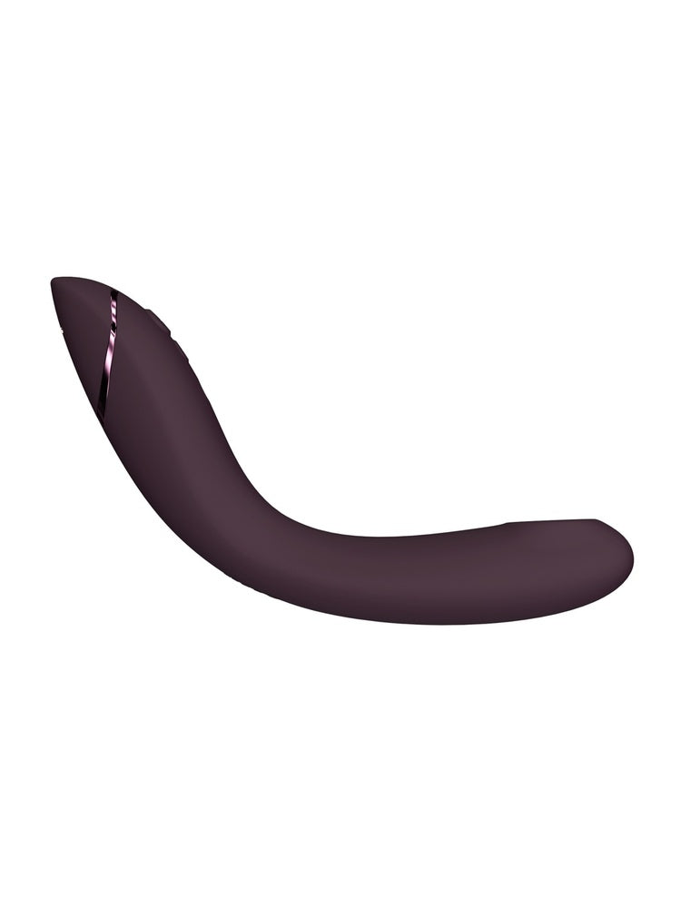 Womanizer OG i aubergine, sett fra siden med buet profil.