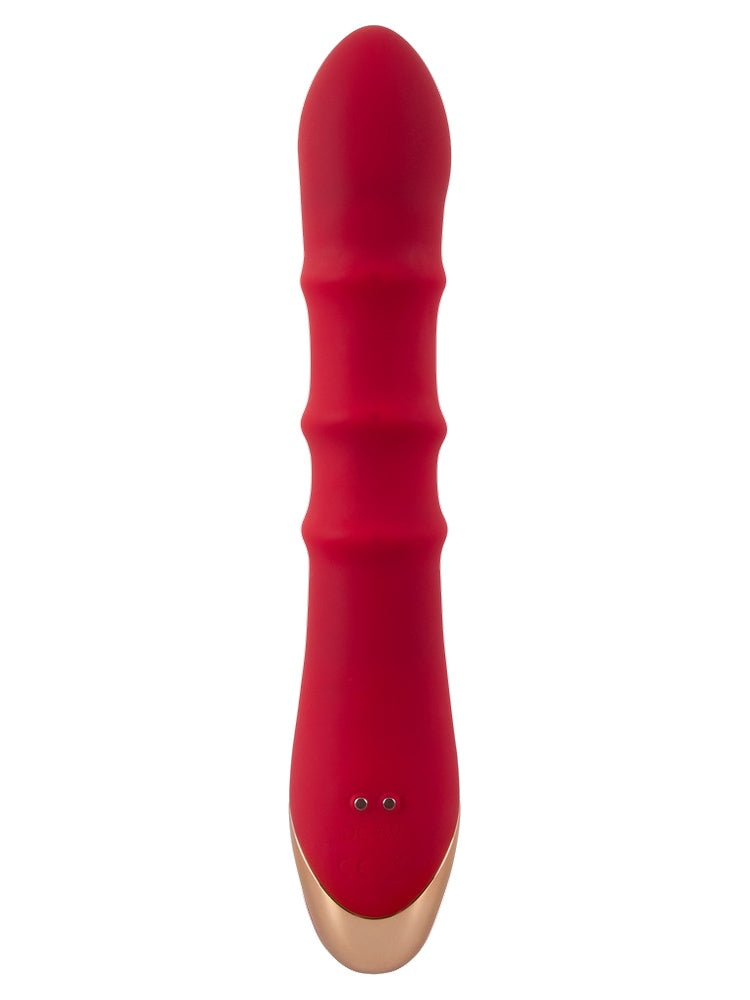 Rabbitvibrator sett fra høyre side – viser buet form og gullfarget håndtak.