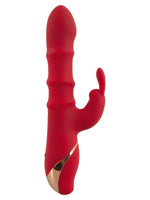 Rabbitvibrator liggende – oversiktsbilde som viser full lengde og klitorisarm.