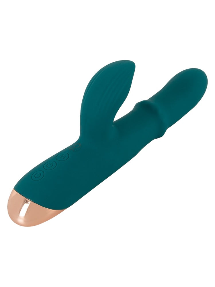 Thumping Rabbitvibrator liggende – oversiktsbilde som viser full lengde og bred klitorisarm.