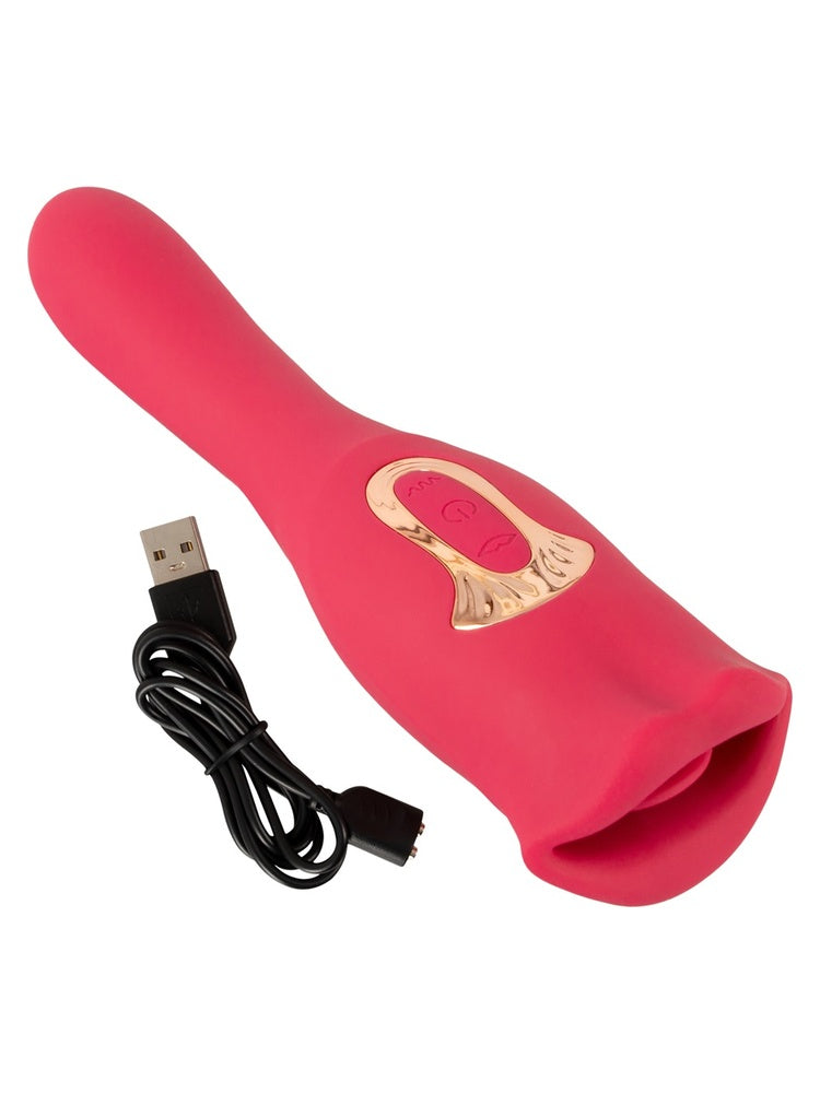 Sidevisning av tungevibrator med ladekabel