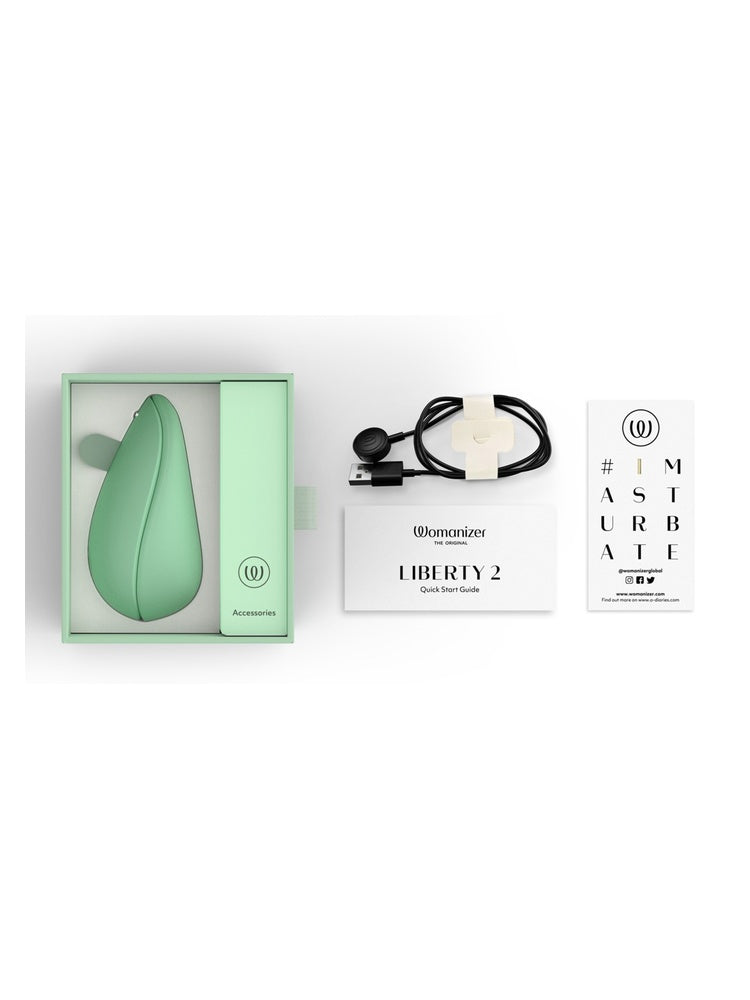 Innhold i pakken: Womanizer Liberty 2, ladekabel, hurtigstartguide og kort.