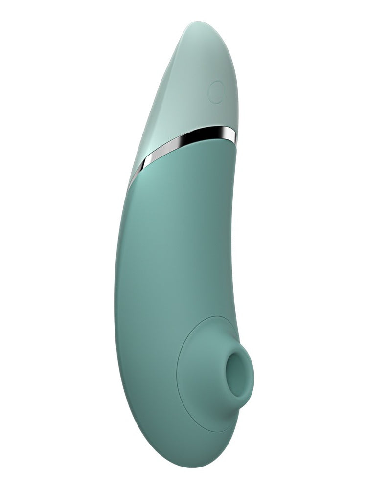 Womanizer Next klitorisstimulator sett forfra, i mintgrønn silikon med sølvdetalj og avrundet stimulatorhode.