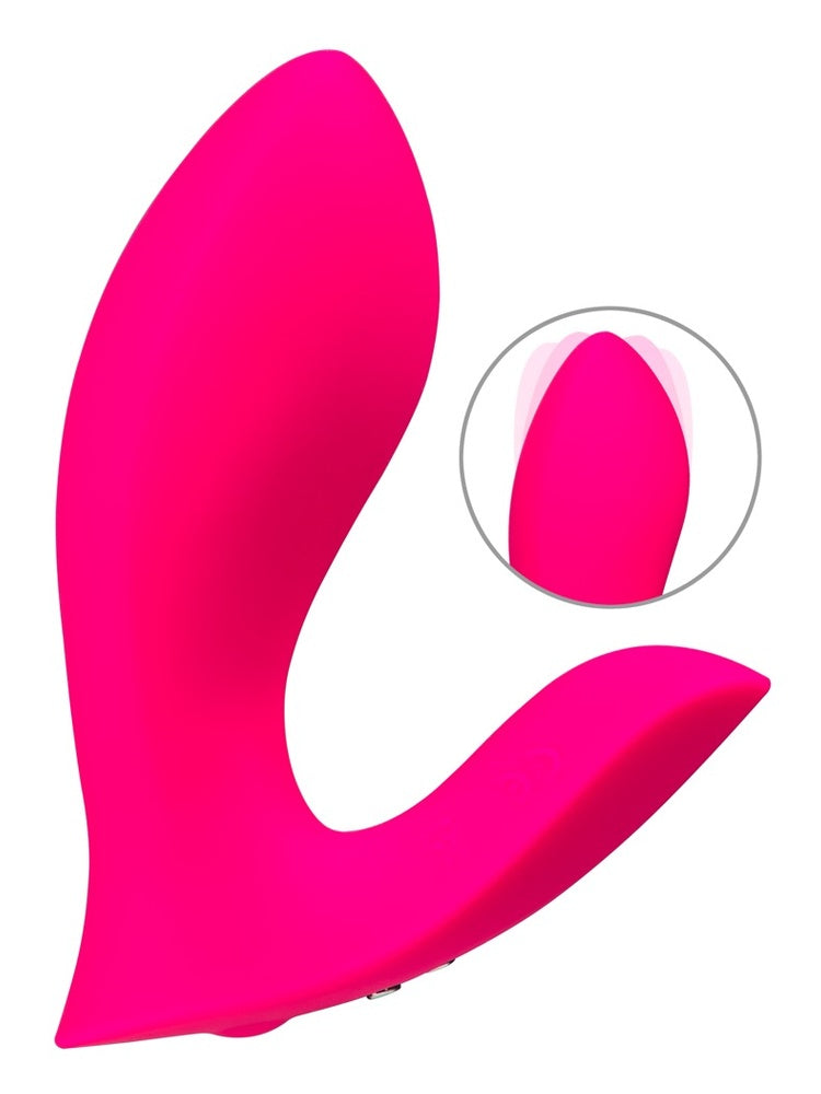 Lovense Flexer trusevibrator i magenta, sett forfra med innzoomet detalj som viser «come-hither»-bevegelsen i G-punkt-armen.