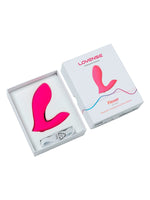 Åpen emballasje med vibratoren i hvit innpakning, ved siden av lukket eske.