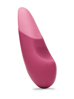 Womanizer Vibe klitorisstimulator i rosa silikon, sett forfra med avrundet tupp og ergonomisk design