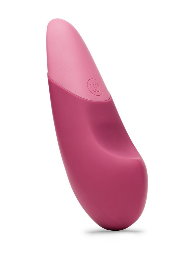 Womanizer Vibe klitorisstimulator i rosa silikon, sett forfra med avrundet tupp og ergonomisk design