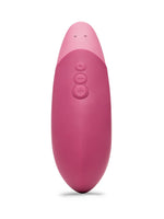 Womanizer Vibe klitorisstimulator i rosa, sett bakfra med kontrollknapper og magnetiske ladekontakter