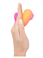 Hånd som holder ROMP Kiss, som viser ergonomisk grep.